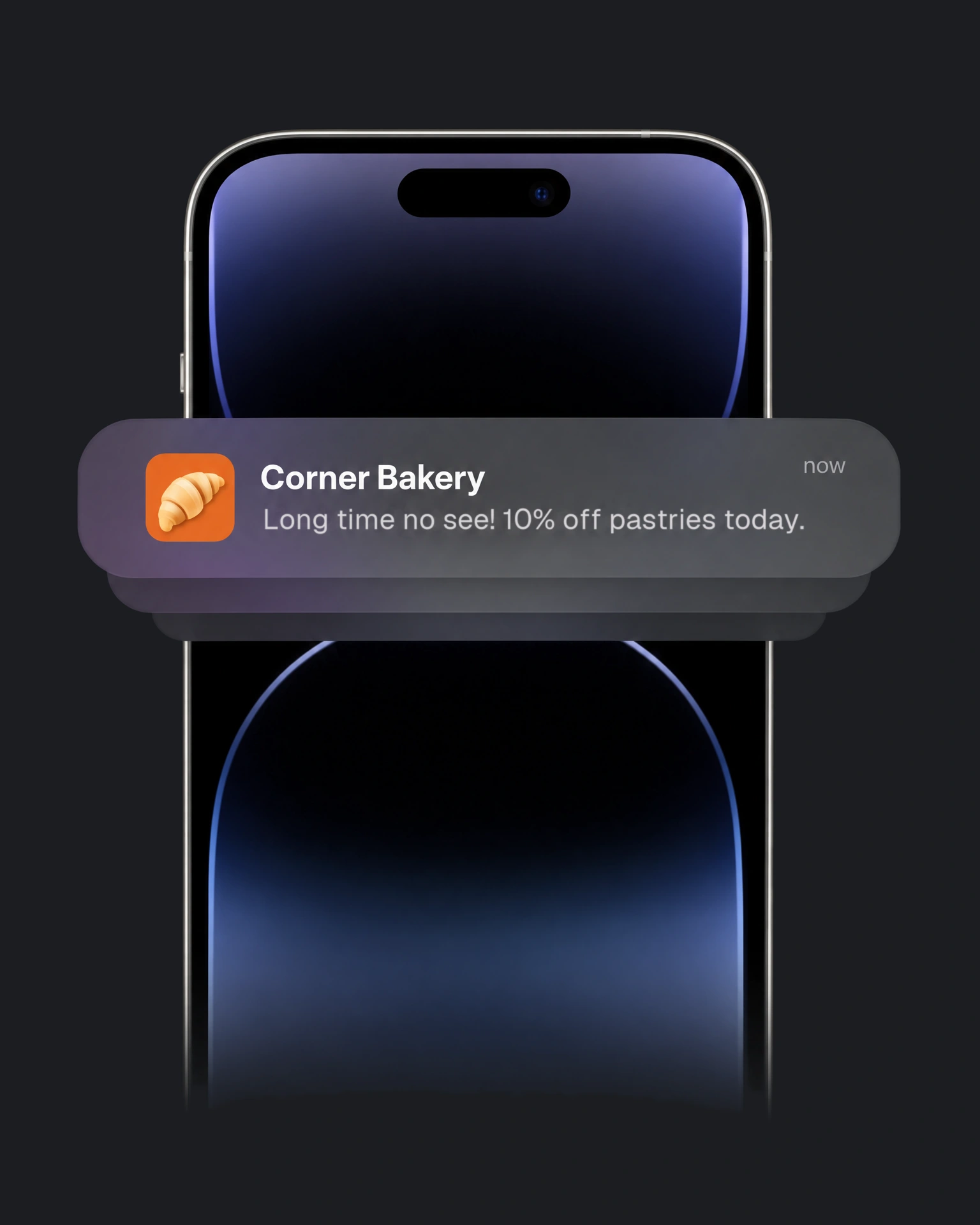 A phone seen from the front. Across it, a message from Corner Bakery: “Long time no see! 10% off pastries today.”